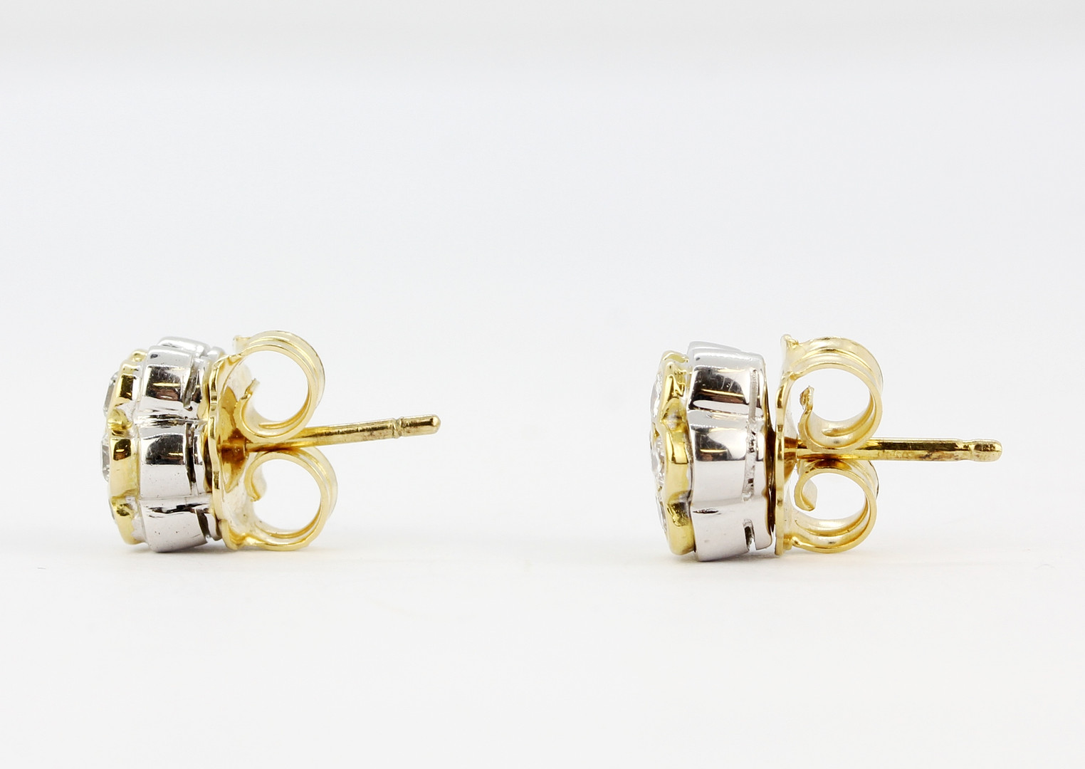 A pair of yellow and white metal (tested high carat gold, minimum 18ct) daisy cluster stud - Image 2 of 5