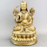 A Tibetan gilt bronze of Tsong Kappa, H. 24cm.