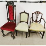 A 19th century Queen Anne style carved oak hall chair together with a further carved oak chair and a