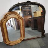 A gilt framed and decorated mirror together with a further carved mirror, largest 120 x 110cm.