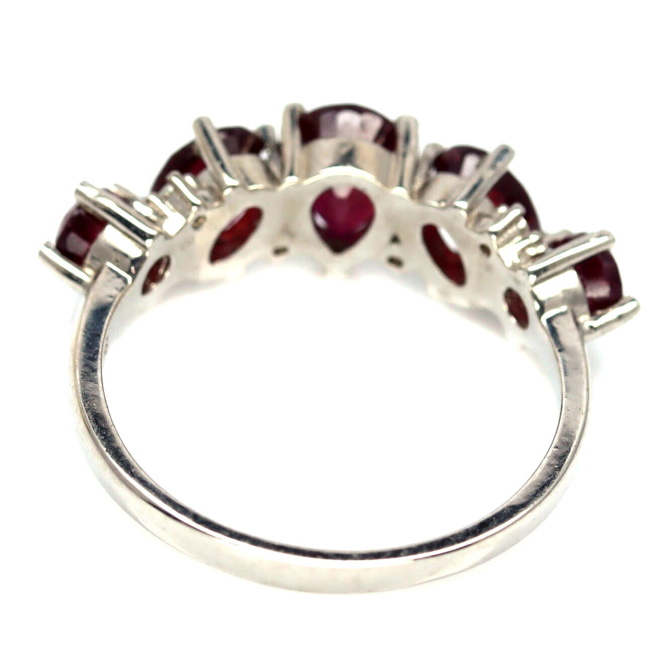 A 925 silver ring set with pear and oval cut rubies, (O). - Image 3 of 3