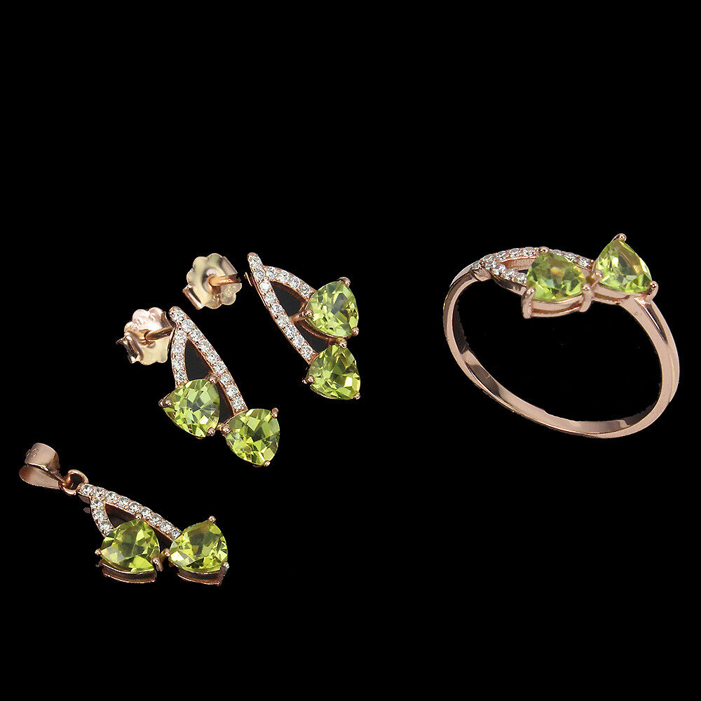 A jewellery suite of rose gold on 925 silver set with trillion cut peridots and white stones,