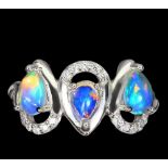 A 925 silver ring set with pear cabochon cut opals and white stones, (N).