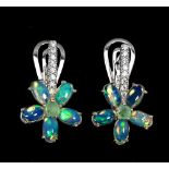 A pair of 925 silver flower shaped earrings set with cabochon cut opals, emeralds and white