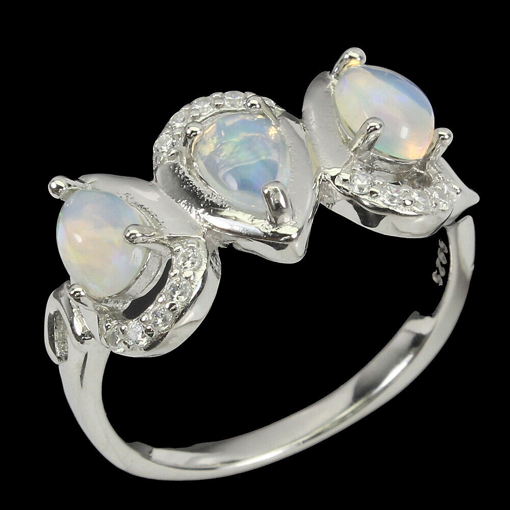 A 925 silver ring set with pear cabochon cut opals and white stones, (N). - Image 2 of 2