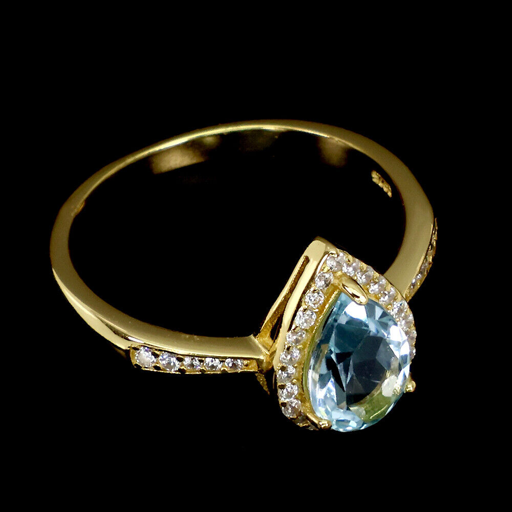 A matching gold on 925 silver ring set with pear cut blue topaz and white stones, (O.5). - Image 3 of 3