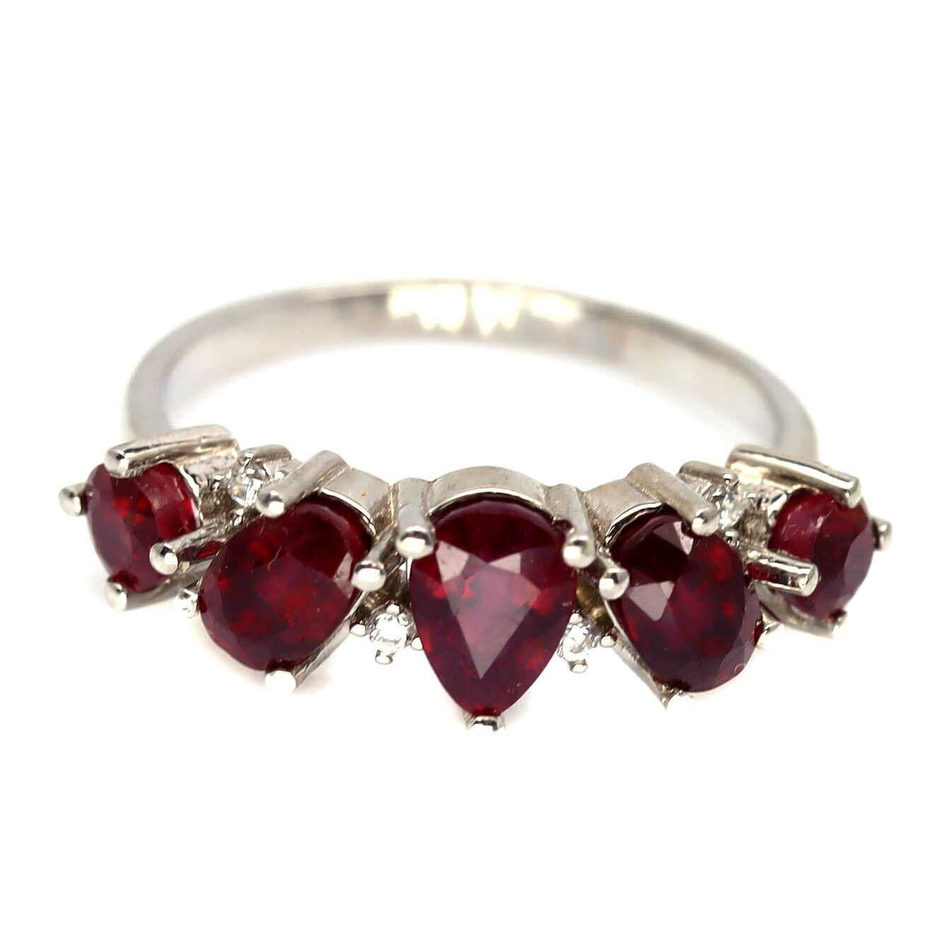 A 925 silver ring set with pear and oval cut rubies, (O). - Image 2 of 3