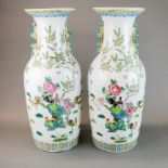 A pair of large Chinese hand enamelled porcelain vases, H. 59cm.