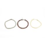 Two stone set 925 silver bracelets together with a 925 silver gilt bracelet, longest L. 19.5cm.