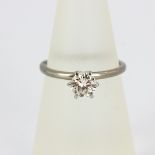 An 18ct white gold solitaire ring set with a brilliant cut diamond, ring size N. approx. 0.50ct.
