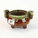 A Chinese glazed Ming Dynasty style pottery oil lamp, W. 15cm, H. 9cm, possible of the period.