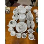 An extensive white and gold porcelain tea and dinner service.