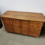 An Ercol 'Golden Dawn' four drawer elm sideboard/ dresser, 130 x 78 x 50cm.