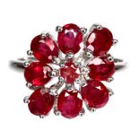 A 925 silver ring set with oval cut rubies, (N.5).