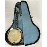 A George Formby banjo, signed, L. 57cm.