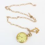A lady's rolled gold fob watch with a rose metal albert chain and a 9ct gold masonic fob.