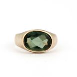 A heavy 8ct yellow gold (stamped 333) ring set with a green tourmaline, stone size 1.3 x 1cm, (P).