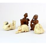 A group of Japanese carved fruitwood and bone netsuke, tallest 5cm.