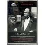 A framed poster for 'The Godfather', 64 x 90cm.