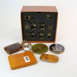 A boxed military tick tack toe game with R.A.F compact, cased monocle and other items.