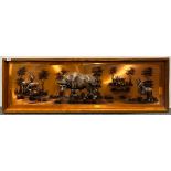 A large hardwood framed African copper panel of animals, 51 x 157cm.