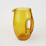 A 1970's amber crackle glass jug, possibly Whitefriars, H. 19.5cm.