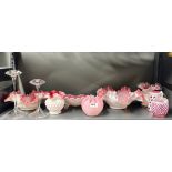 A quantity of good pink and white glassware with two signed clear glass candle holders.