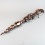An interesting African carved hardwood stick with integral wooden bead rattle to ward off evil