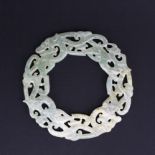 A Chinese archaic form carved jade Pi disc, dia. 10cm.
