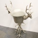 A large silvered metal stag ice bucket, W. 68cm, H. 106cm.