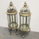 A pair of large gilt metal storm lanterns, H. 84cm.