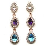 A pair of rose gold on 925 silver drop earrings set with pear cut amethyst, blue topaz and white