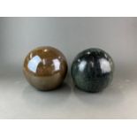 Two large glazed ceramic garden balls, dia. 25cm.