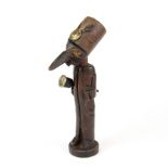 An interesting hand carved tobacco pipe with stand and tamper, H. 16.5cm.