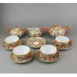 A 1930's oriental porcelain part tea set, slightly A/F.