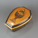 A lacquered and gilt box with hinged lid, 28 x 20 x 11cm.