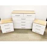 A modern chest of drawers together with a pair of three drawer bedside cabinets, largest 100 x 86