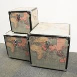 A nest of three cabin style trunks featuring world maps, largest 46 x 46 x 46cm.