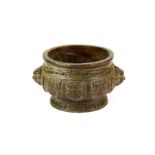 A small Chinese copper bronze censer with lion head decoration, W. 9cm, H. 4.8cm.