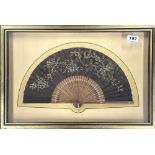 A gilt framed Chinese hand painted sandalwood fan, frame size 52 x 35cm.