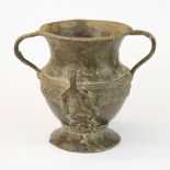 Antiquity interest: An early bronze two handled vessel, possibly Roman, H. 16cm.