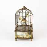 A small brass bird cage clock, H. 16.5cm.