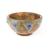 A 1920's Liberty style wooden fruit bowl with hammered pewter and ceramic bead overlay, dia. 26cm.