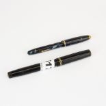 Two vintage fountain pens with 14ct gold nibs.