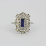 A platinum Art Deco sapphire and diamond set ring, L. 1.8cm, (O).
