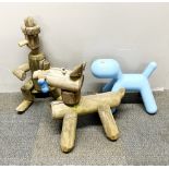 Two wooden garden figures and a plastic dog, tallest H. 58cm.