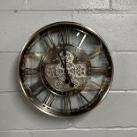 An interesting metal skeleton style battery wall clock, dia. 53cm.