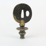 An unusual Japanese bronze Tsuba finiale, H. 10.8cm.