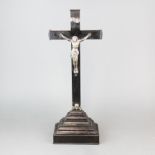 A 19th century continental silver (tested) and ebony crucifix, H. 52cm.