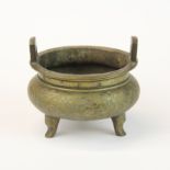 An early 20th century Chinese bronze censer, dia. 12, H. 10cm.